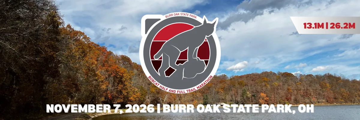 Scenic view of Burr Oak State Park with autumn foliage, a lake, and the race logo and details overlaid.
