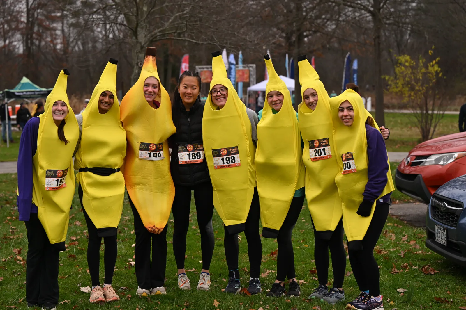 A group of runners dressed as bananas smile for a photo at the Fall Classic race.