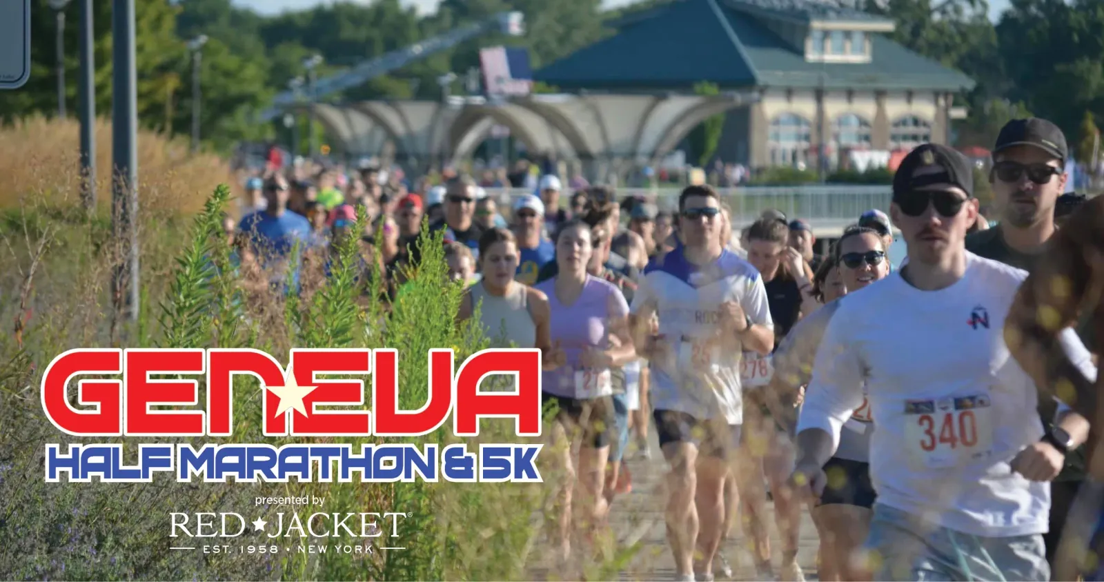 Runners participating in the Geneva Half Marathon & 5K, with the race logo prominently displayed.