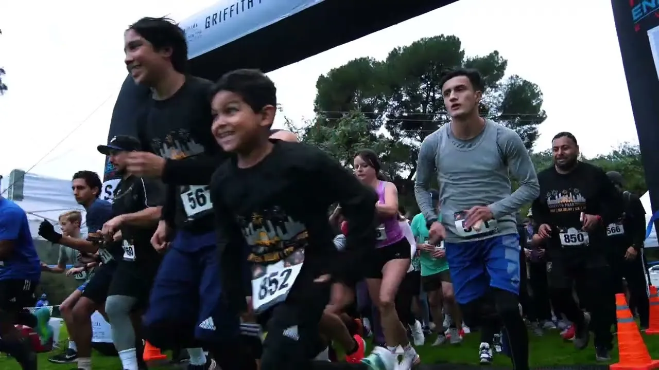 Runners in action at the start line of the Griffith Park Resolution Run.