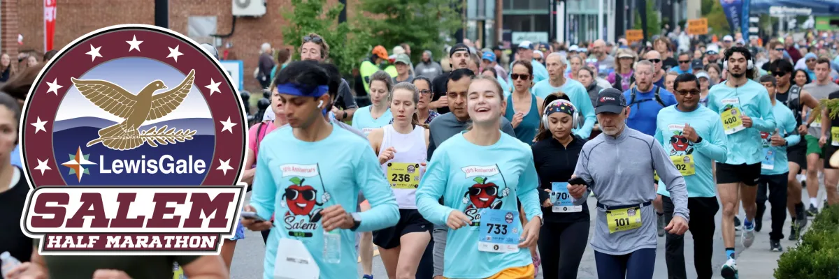Runners participating in the LewisGale Salem Half Marathon, with the race logo visible.