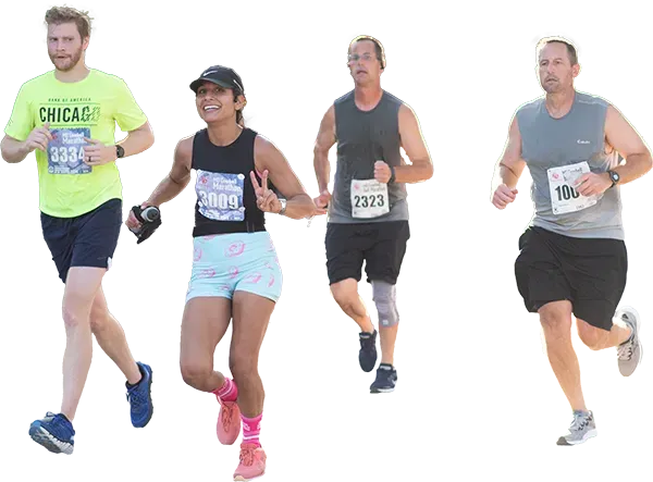 Runners participating in a race, with one woman in the foreground smiling and giving a peace sign.