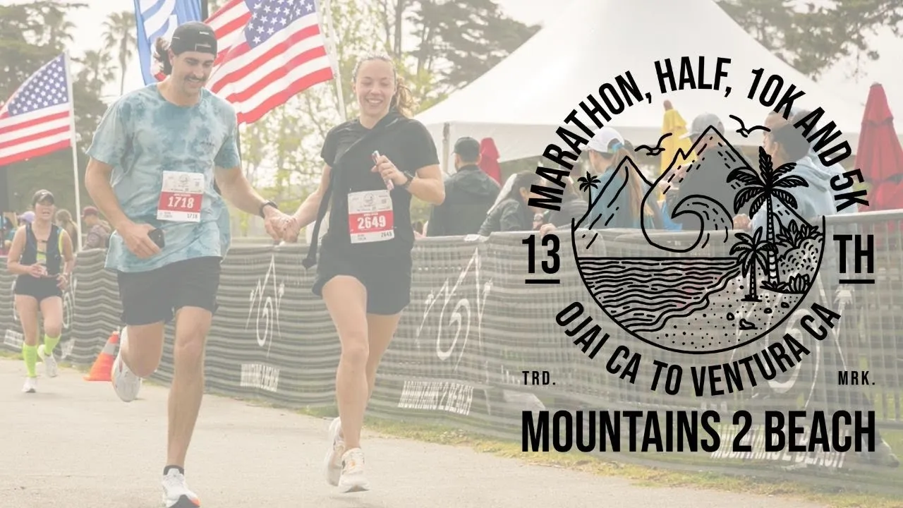 A male and female runner smile as they run side-by-side, holding hands, with American flags in the background and race branding overlaid on the right side.