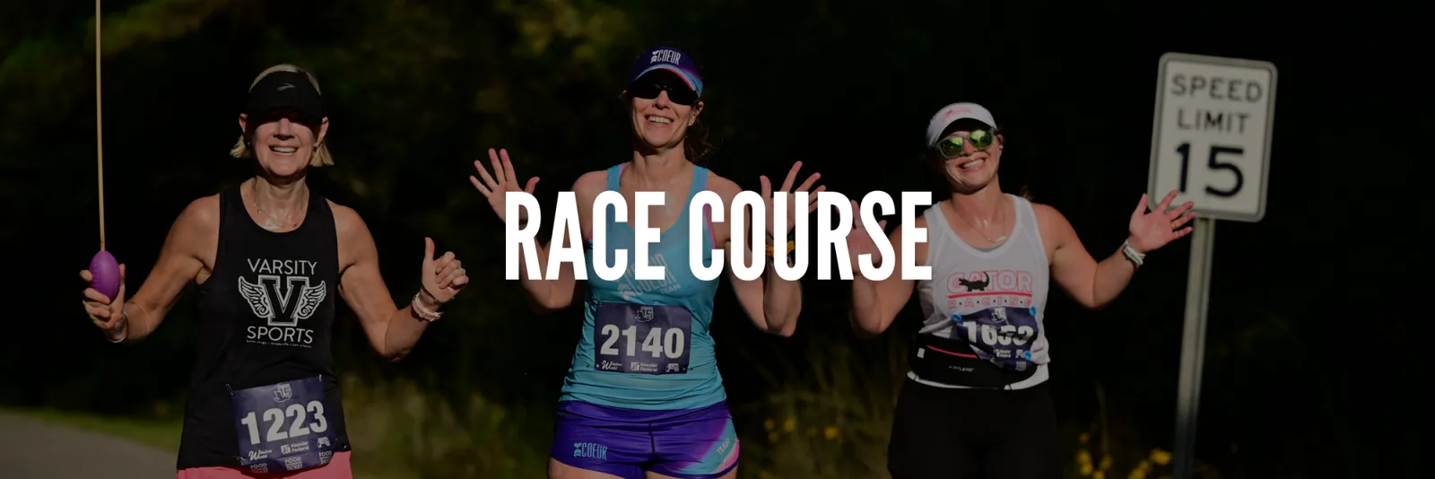Three female runners smiling and waving on a road, with the text 'RACE COURSE' overlaid on the image.