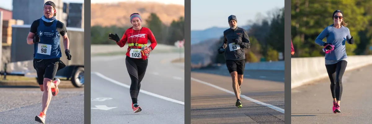 Four runners in action on a road during a race.