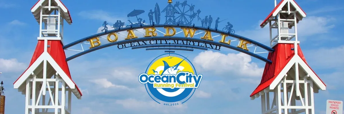 Ocean City Boardwalk entrance arch with the Ocean City Running Festival logo displayed prominently.
