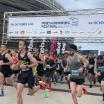 Runners starting the Perth Running Festival half marathon.