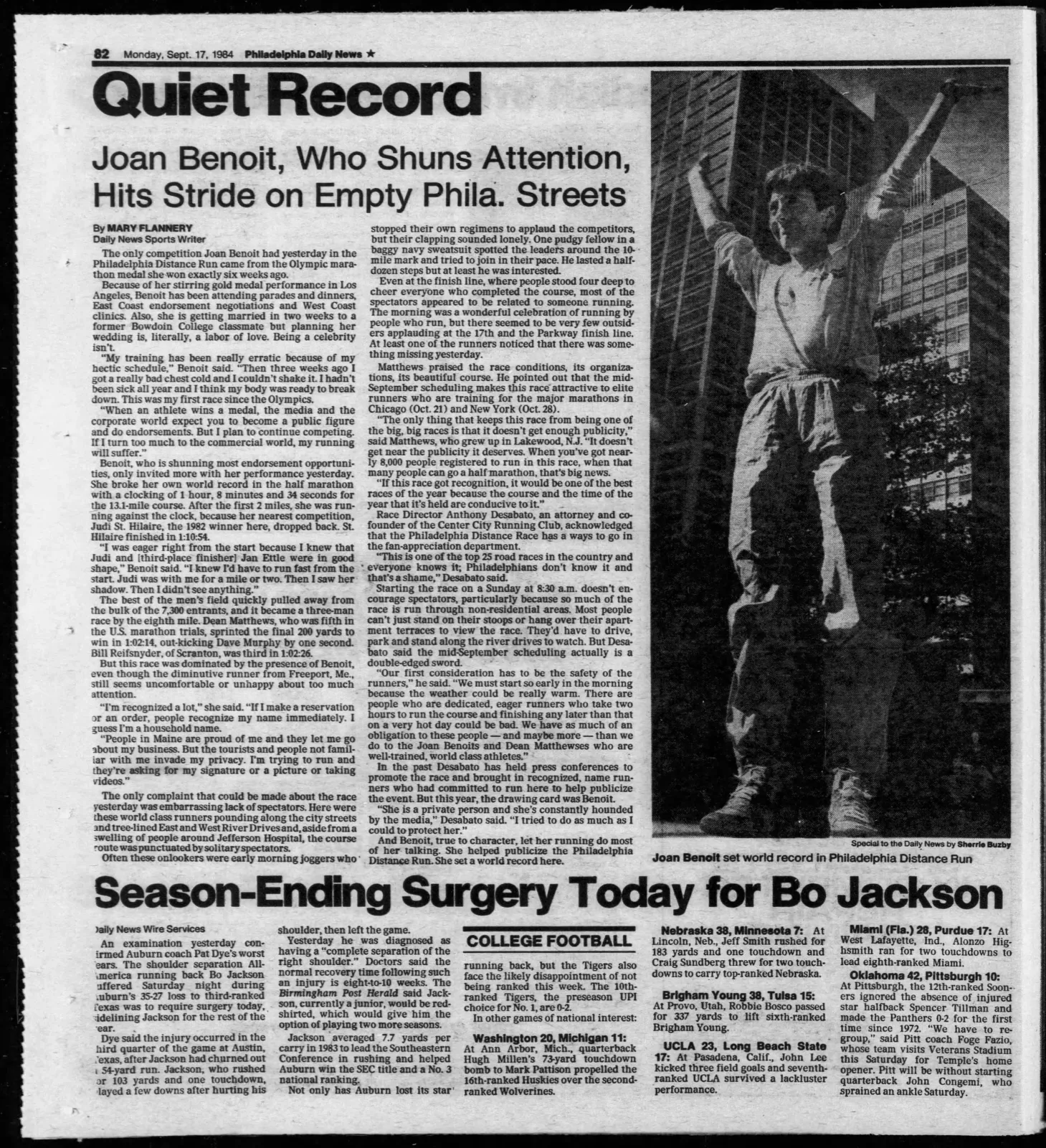 Joan Benoit, winner of the Philadelphia Distance Run, raises her arms in celebration after setting a world record.