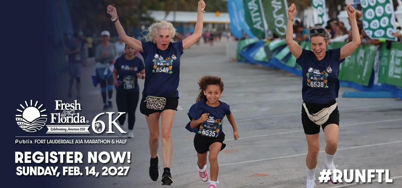 Three runners, two women and a young girl, crossing the finish line with their arms raised in celebration, with race branding and registration information overlaid.