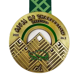 Revel Mt Charleston Marathon 2021 medal featuring mountains and a turtle logo.