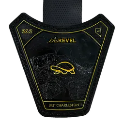 Revel Mt. Charleston half marathon medal featuring a turtle logo and mountain scenery.