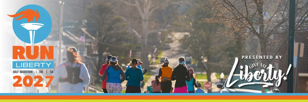 Runners participating in the Run Liberty half marathon, 10k, and 5k in 2027, with the race logo and sponsor information visible.