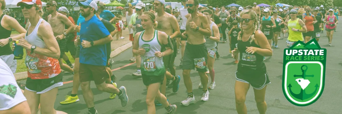 A group of runners starting a race, with the Upstate Race Series logo in the foreground.