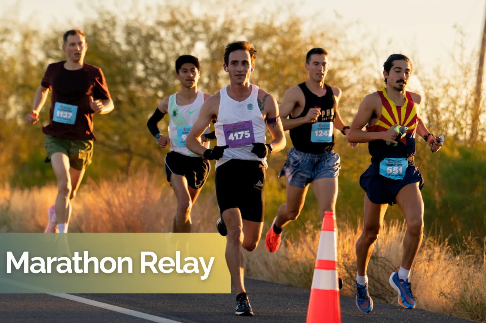 Runners competing in the Tucson Marathon Relay during golden hour.